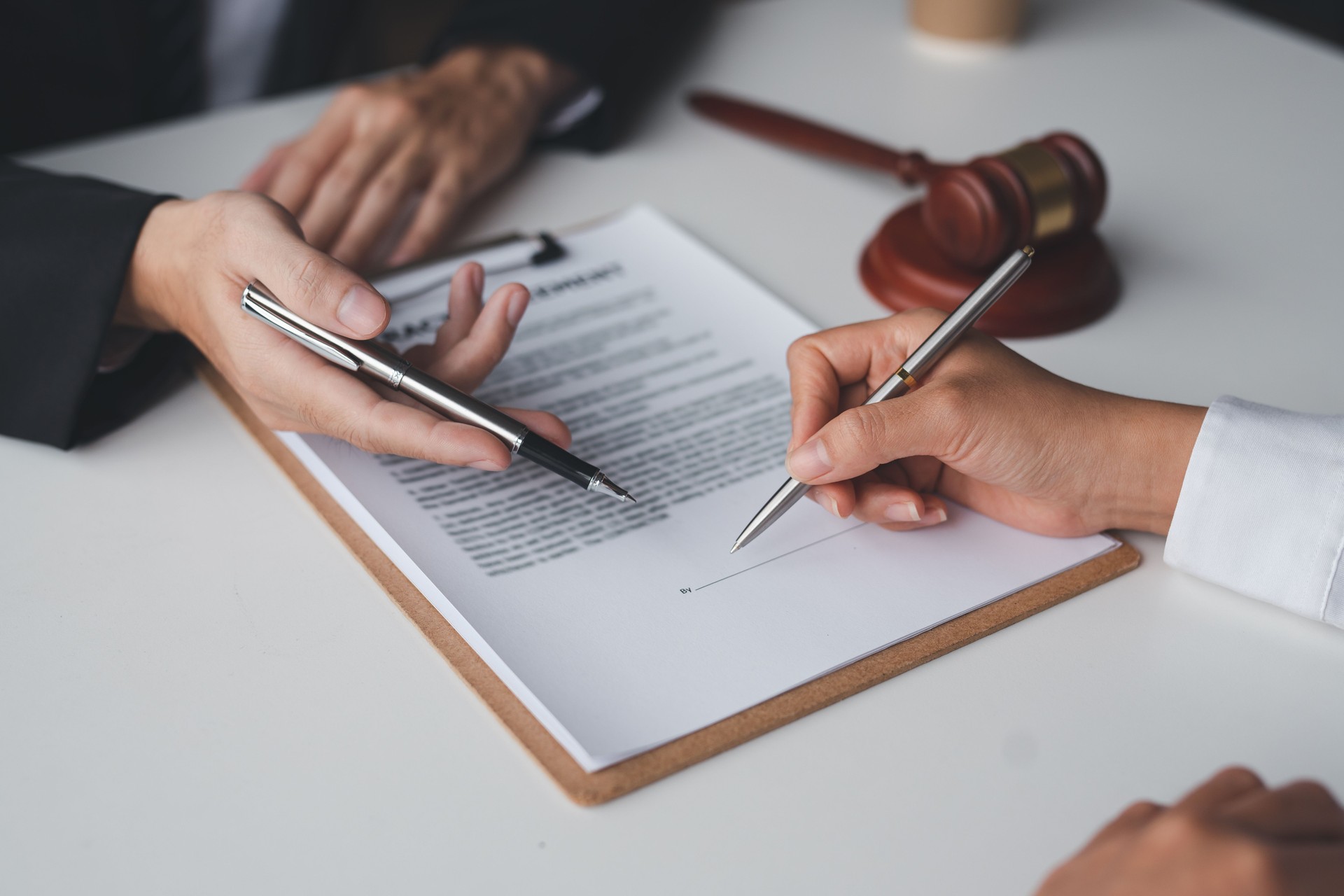 Businessman and lawyer discuss and advice on contract documents. Legal Treaty Agreement business contract